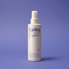 White bottle labeled 'Curling Fixer' on a purple background