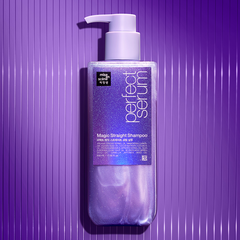 Shampoo bottle labeled 'Perfect Serum' on a purple background