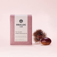 OSULLOC tea box with a chestnut on a pink background