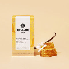 Osulloc vanilla honey black tea packaging with a honeycomb and vanilla bean on a beige background