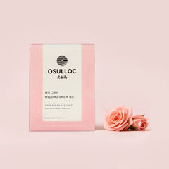 OSULLOC wedding green tea packaging with a pink rose on a light pink background