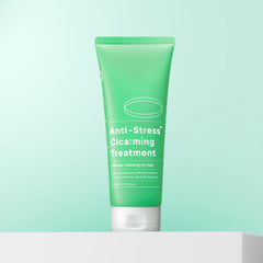 Green tube of Anti-Stress Cica:ming Treatment on a light green background
