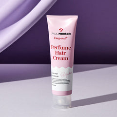 Tube of Paul Medison perfume hair cream on a purple background