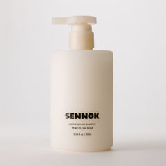 Sennok shampoo bottle with pump on a light gray background