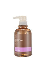 Brown bottle with pump and purple label on a white background