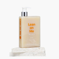 Bottle of 'Lean on Me' product on a white background
